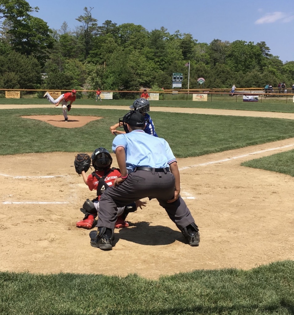 Umpire behind the plate during a youth baseball game